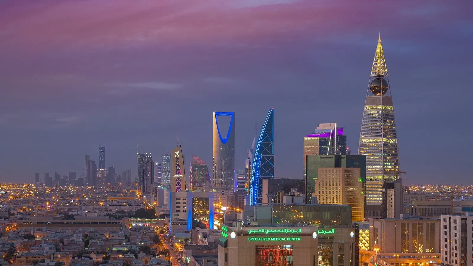 Riyadh skyline at dusk with the Kingdom Centre